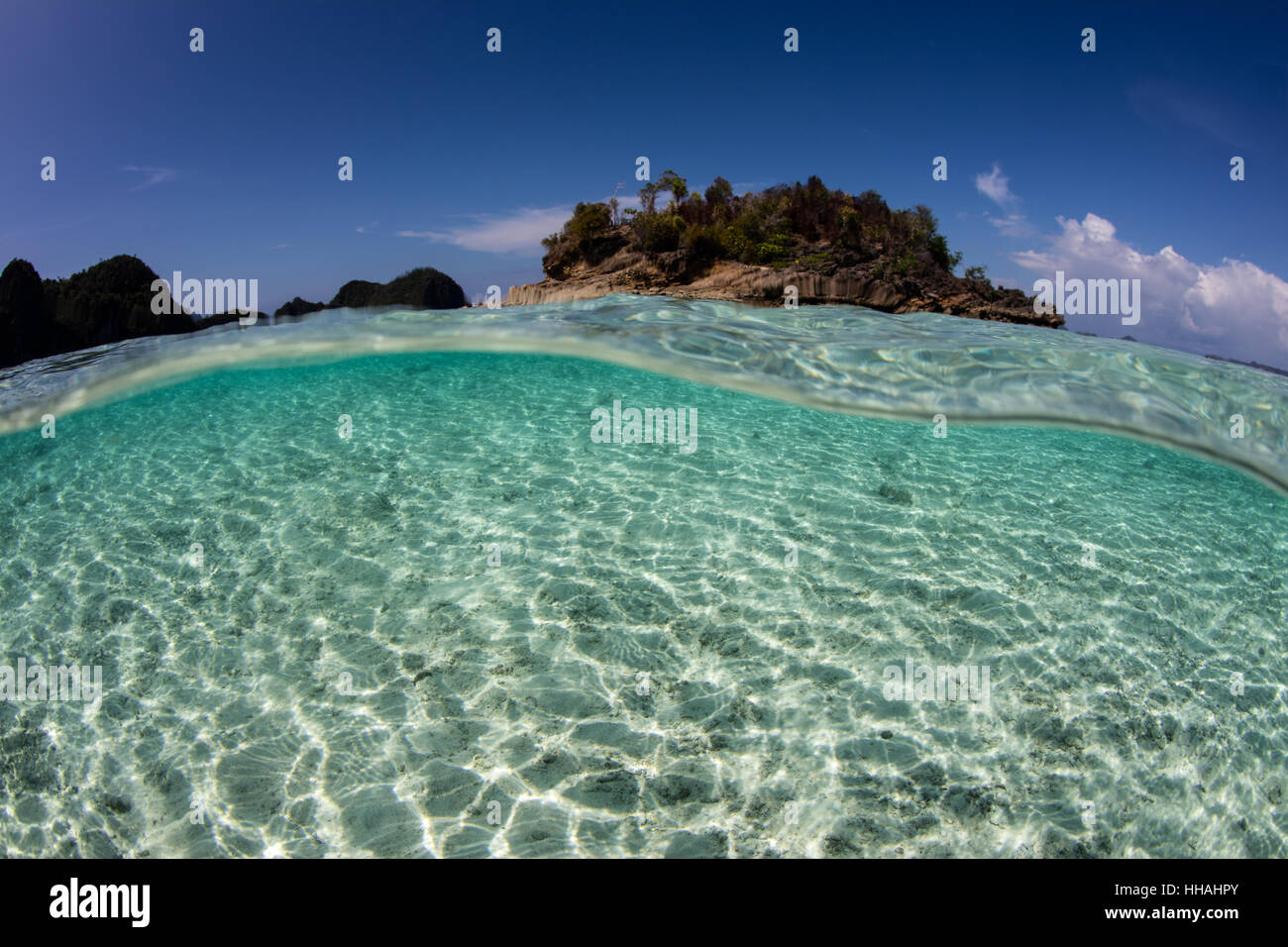 Clear Warm Water Surrounds A Remote Island In Raja Ampat Indonesia This Region Is Known As 