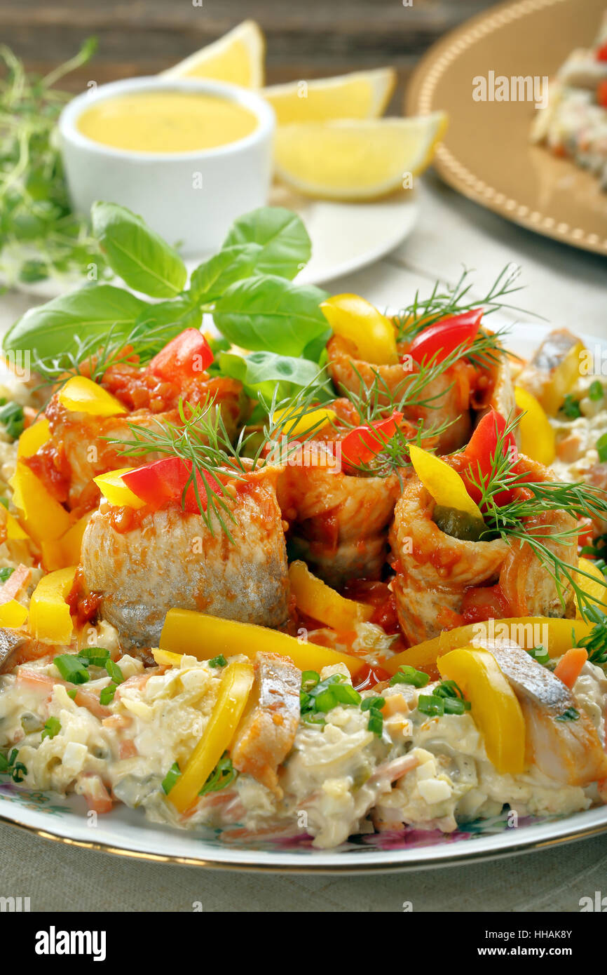 Rolled christmas herrings in tomato sauce Stock Photo Alamy