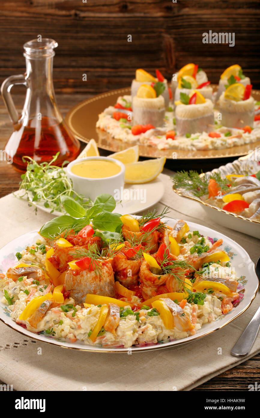 Rolled christmas herrings in tomato sauce Stock Photo Alamy