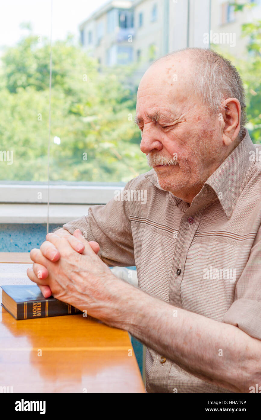 hand, hands, desk, religion, religious, furniture, window, porthole, dormer Stock Photo