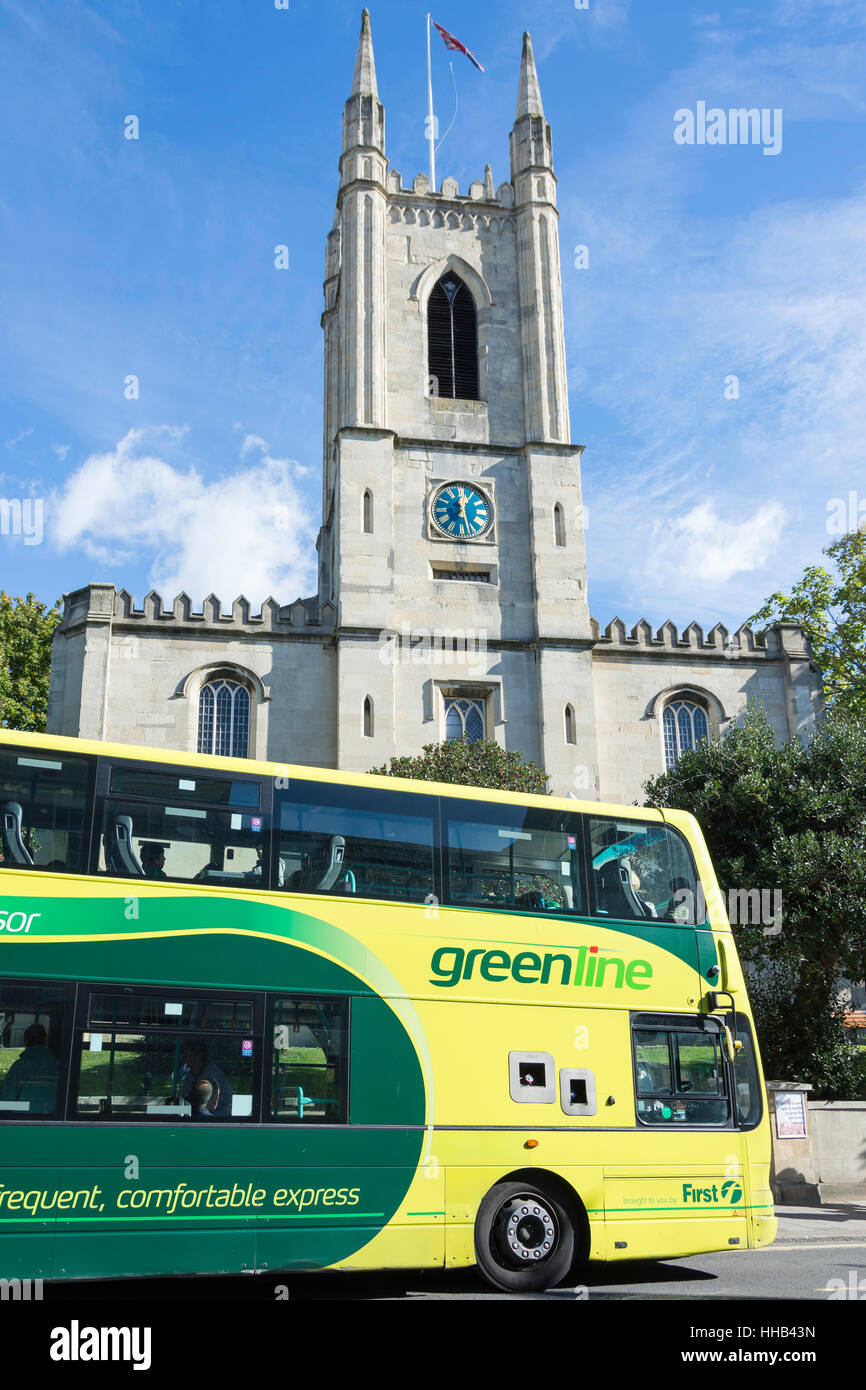Greenline tourist bus by St John the Baptist Parish Church, High Street, Windsor, Berkshire, England, United Kingdom Stock Photo