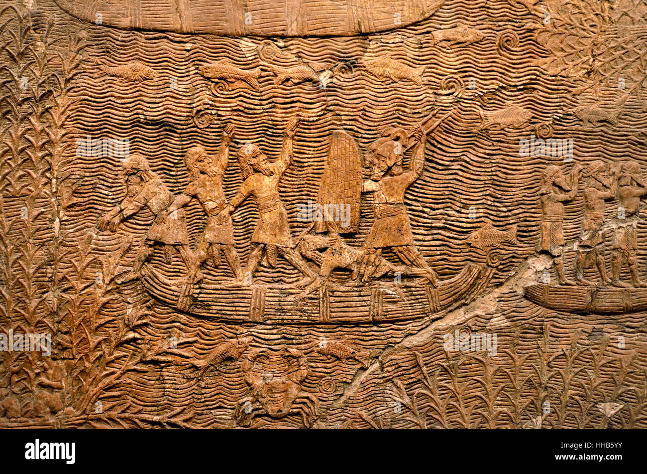 London, England, UK. British Museum. Assyrian panel (c640-620BC) from South West palace in Nineveh. Campaigning in Southern Iraq - slaves on a ship Stock Photo