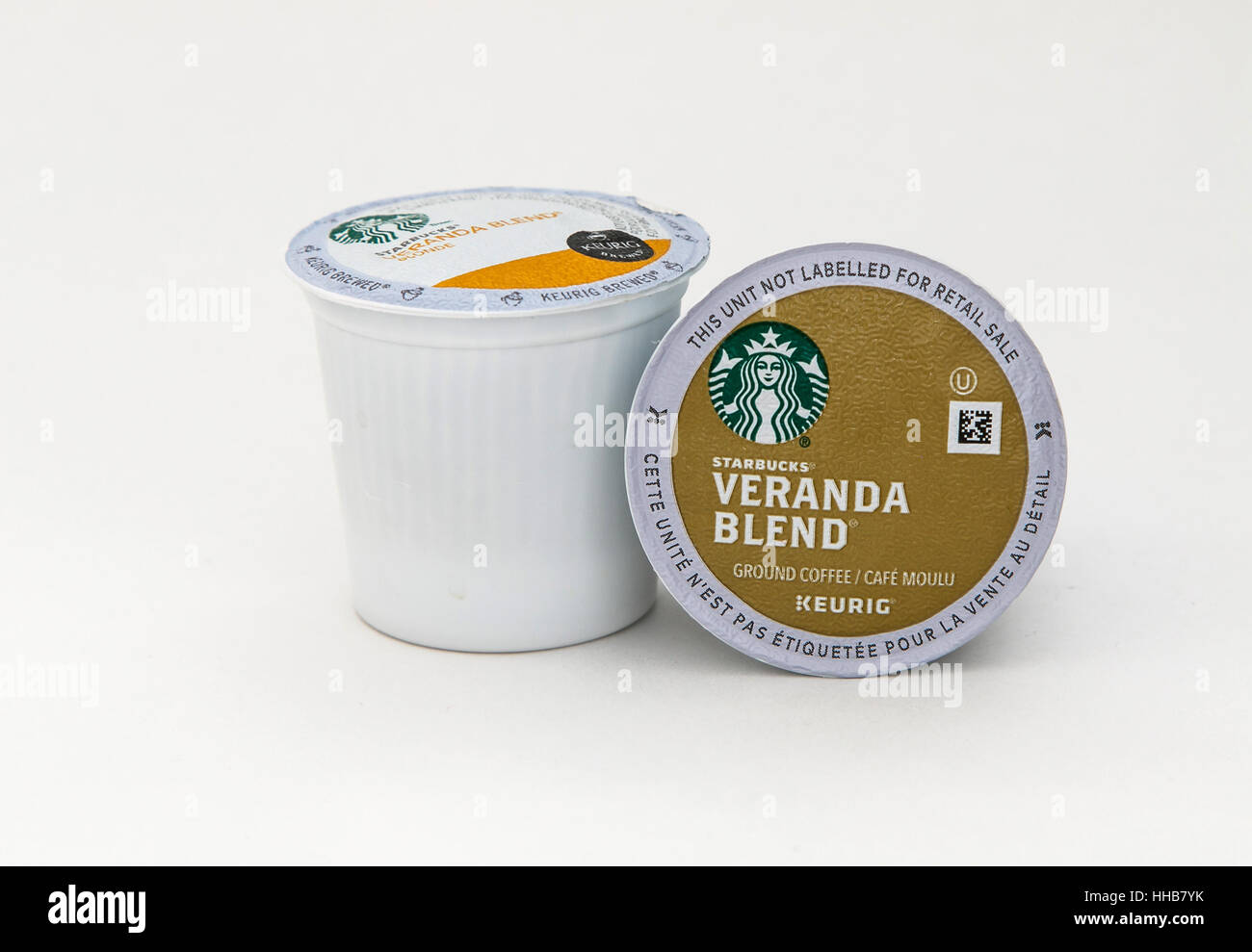 Two Starbucks Veranda Blend coffee capsules for Keurig coffee machine are seen against white background. Stock Photo