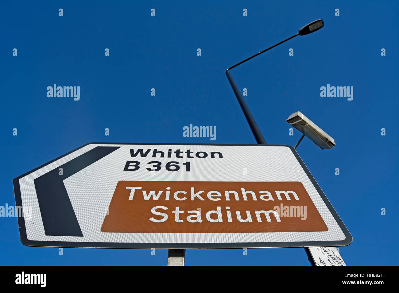 left pointing sign for twickenham stadium, and the B361 road towards whitton, in twickenham, middlesex, england Stock Photo