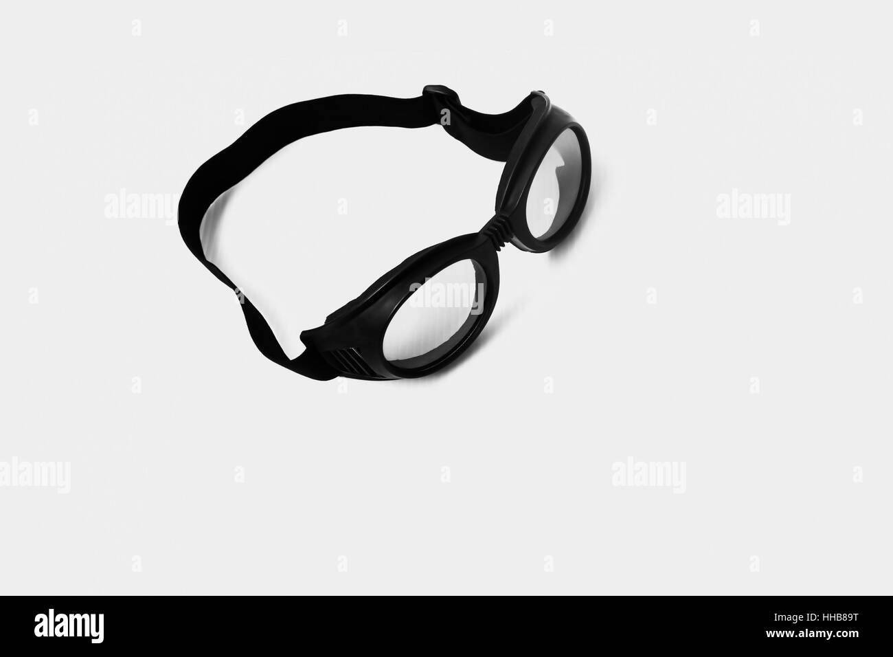 goggles head is black on a white background. Stock Photo