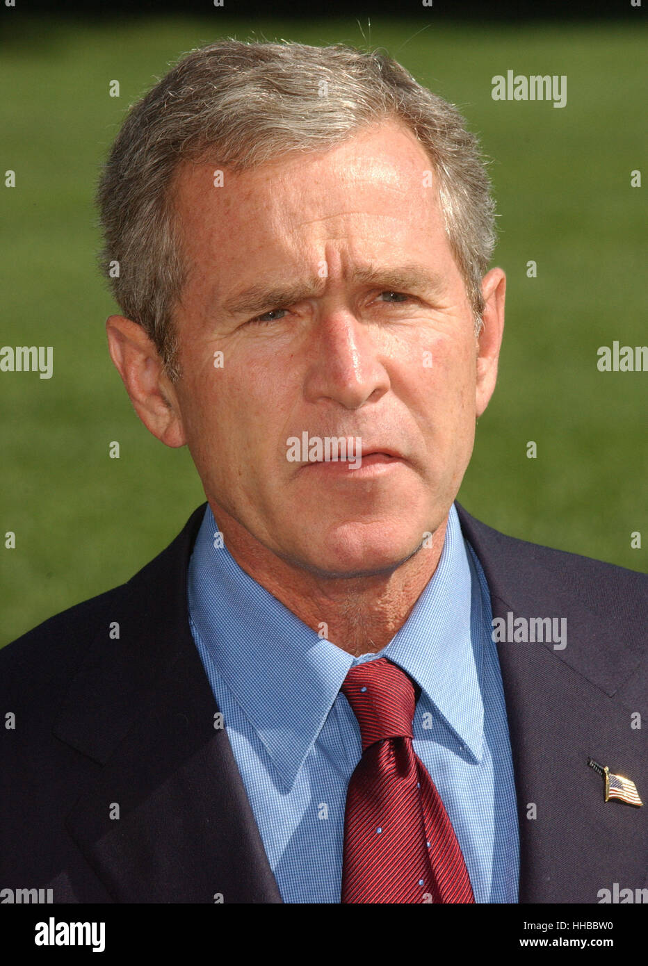 Washington, DC - September 16, 2001 -- United States President George W. Bush returns from a week-end at Camp David on Sunday, September 16, 2001. In remarks to the press as walked to the White House, President Bush warned 'We need to be alert to the fact Stock Photo