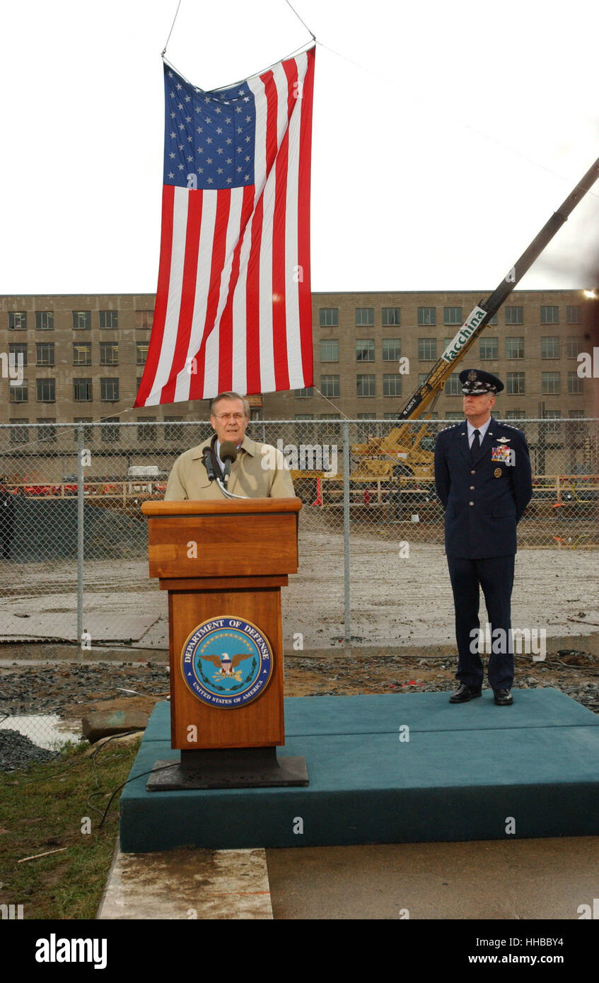 United States Secretary of Defense Donald Rumsfeld, left, and Chairman of the Joint Chiefs of Staff, US Air Force General Richard B. Myers, right, mark the 3 month anniversary of the terrorist attack on the Pentagon at a ceremony at the site of the plane Stock Photo
