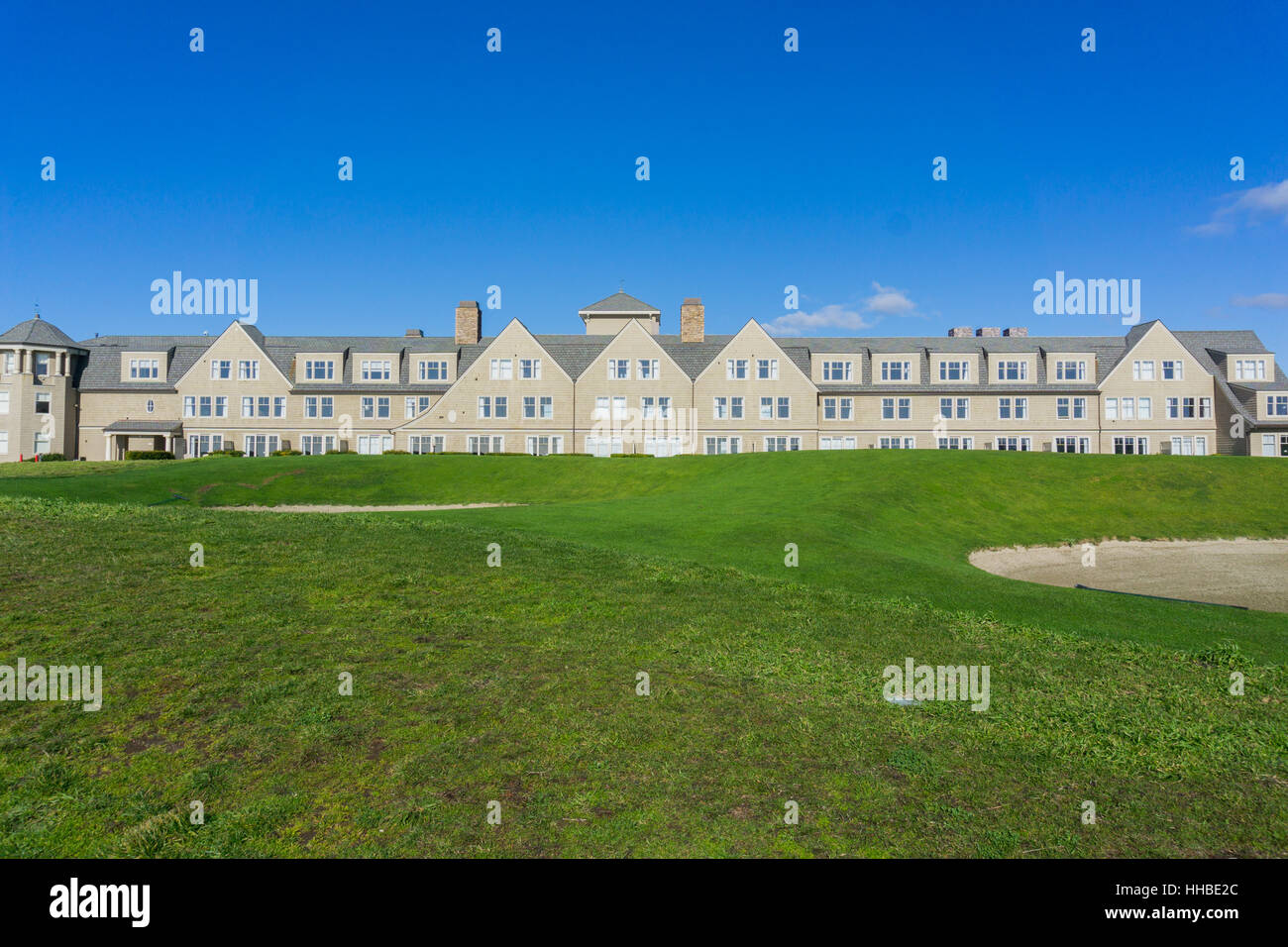 Resort and golf course putting green on the cliffs by the pacific ocean, Half Moon Bay, California Stock Photo