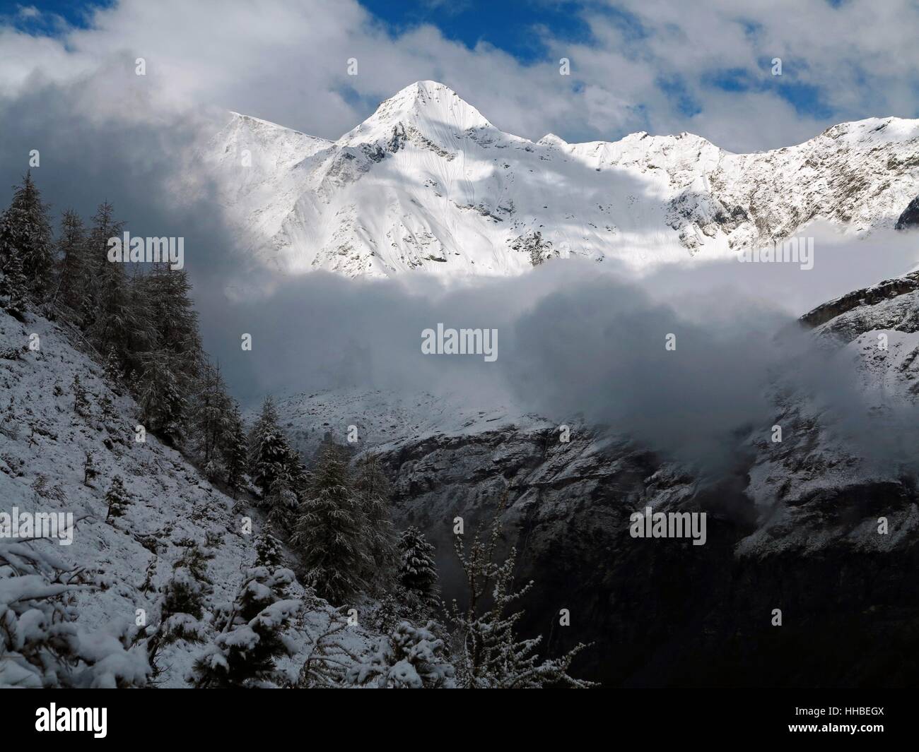 Grand Cornier peak from Zinal, Switzerland on a stormy day. Stock Photo