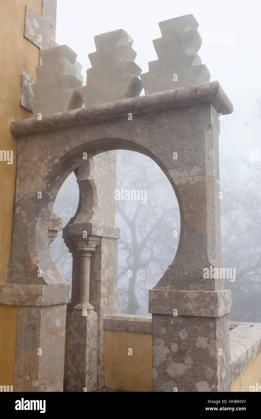 Sintra, Portugal: Horseshoe arch on a foggy morning at Pena Palace. Stock Photo