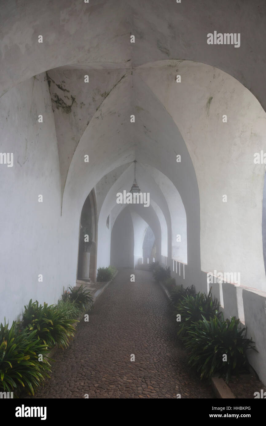 Sintra, Portugal: Multi-ached loggia on a foggy morning at Pena Palace. Stock Photo