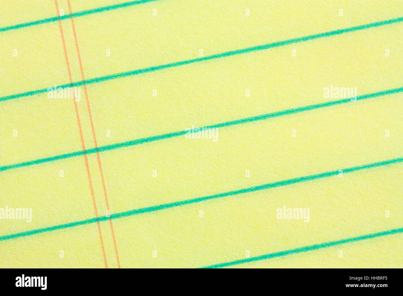 Legal pad of yellow paper background - add your business message Stock  Photo - Alamy, image size:1300x956