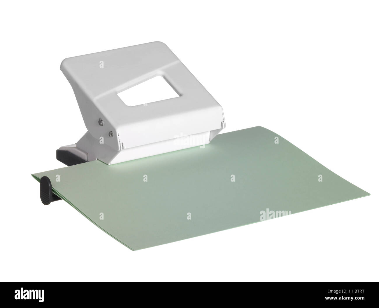 studio photography of a white hole puncher and paper sheet isolated on white, with clipping path Stock Photo