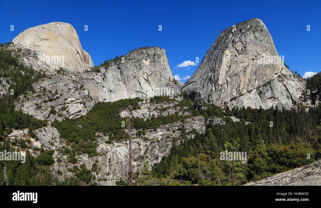 In view are Half Dome (south face), Mount Broderick, and Liberty Cap. Photographed from the John Muir Trail, Yosemite National Park, California. Stock Photo