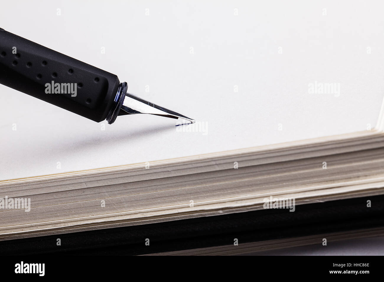 fountain pen and notepad Stock Photo Alamy