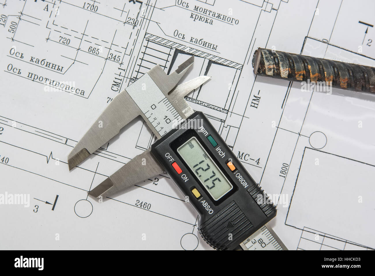 Man holding blueprints at construction site Stock Photo - Alamy