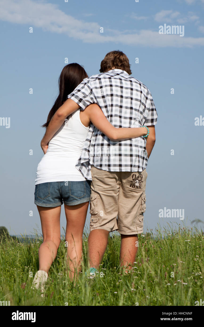 young couple in love happy on a lawn outdoors Stock Photo - Alamy