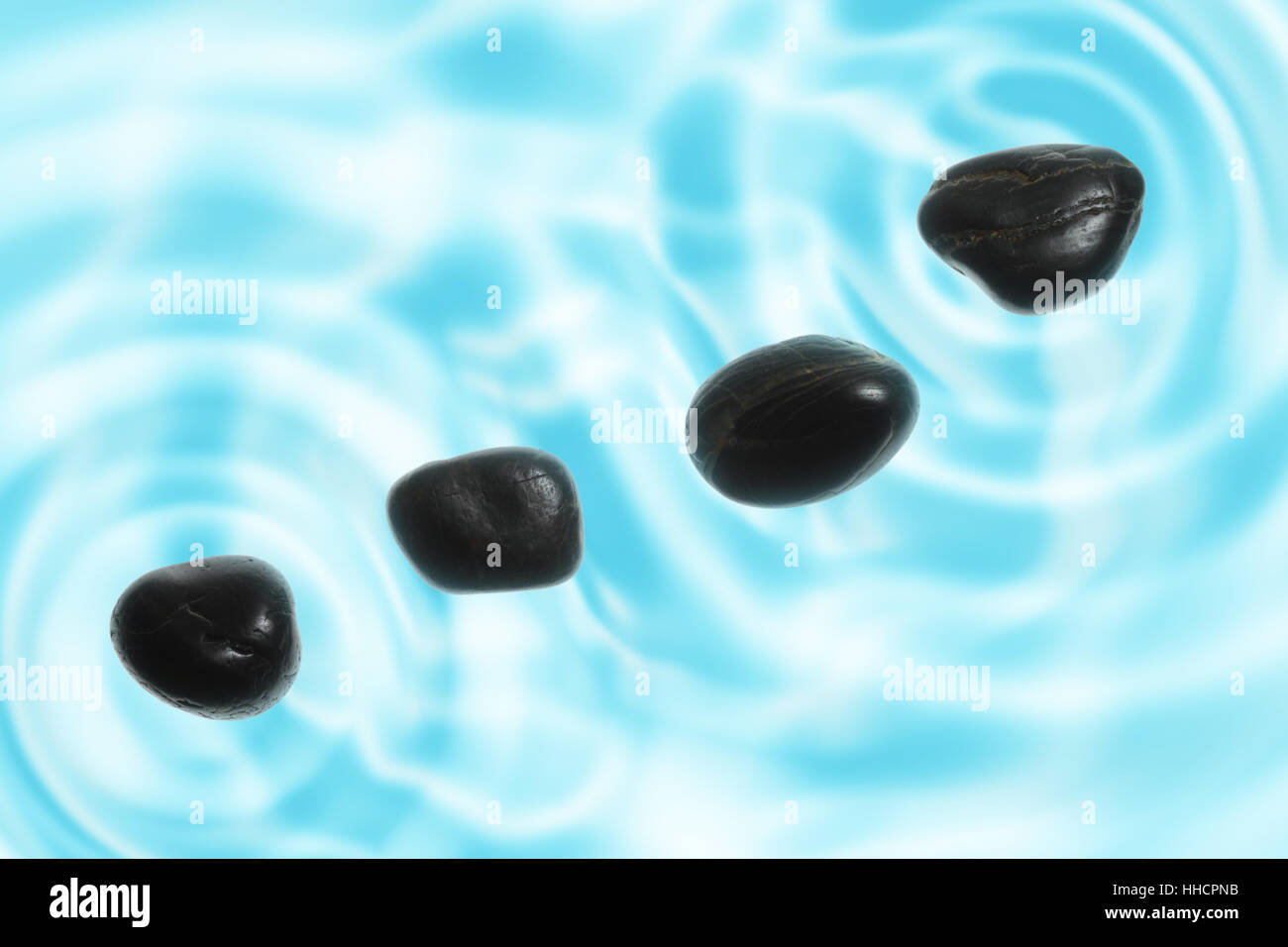stones in water Stock Photo - Alamy