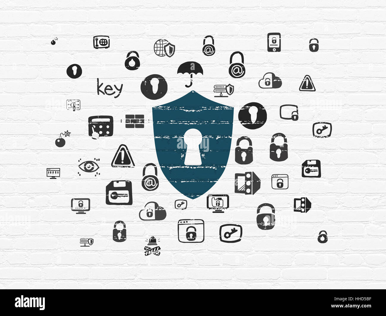 Safety concept: Shield With Keyhole on wall background Stock Photo - Alamy