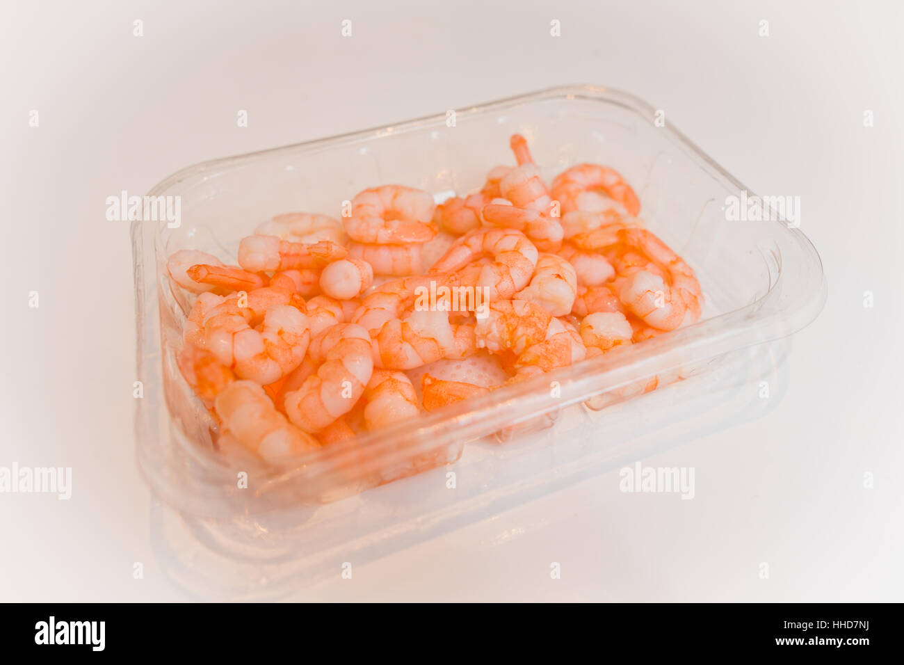 Large prawns in a bowls, cooked and ready to eat, sometimes called shrimps Stock Photo