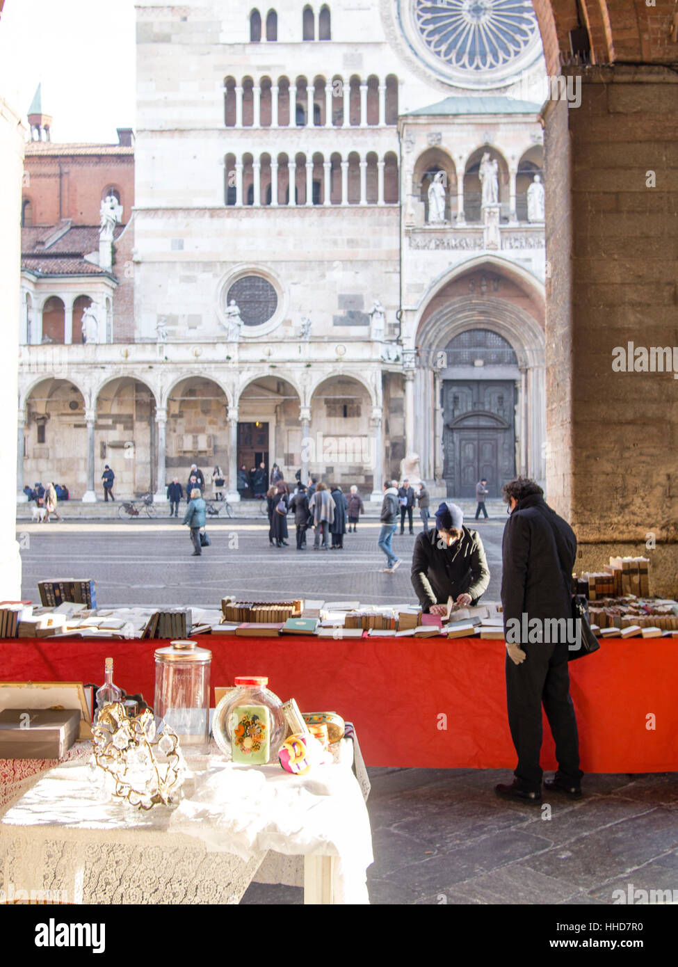 Book seller in street market, winter time, Lombardy, Italy Stock Photo