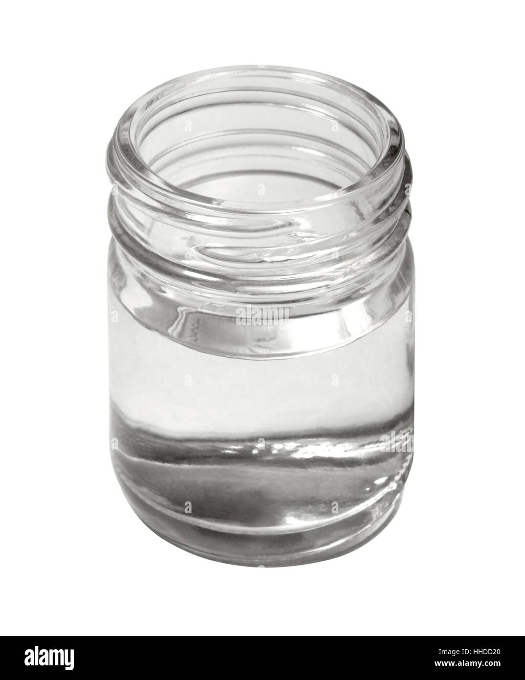studio photography of a open glass with screwtop, filled with clear fluid, isolated on white with clipping path Stock Photo