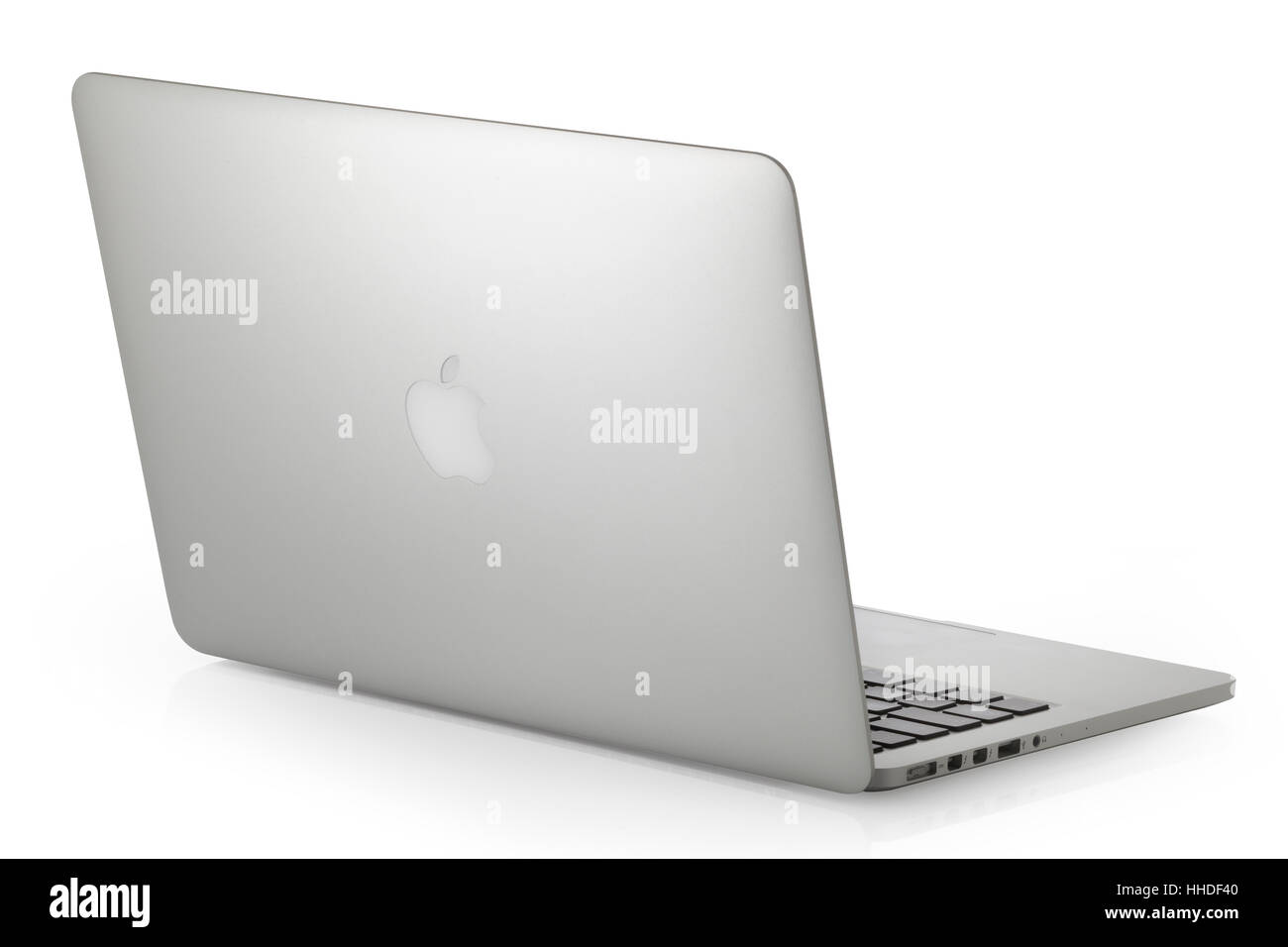 Apple MacBook Pro laptop computer by Apple Inc. on a white background. Stock Photo
