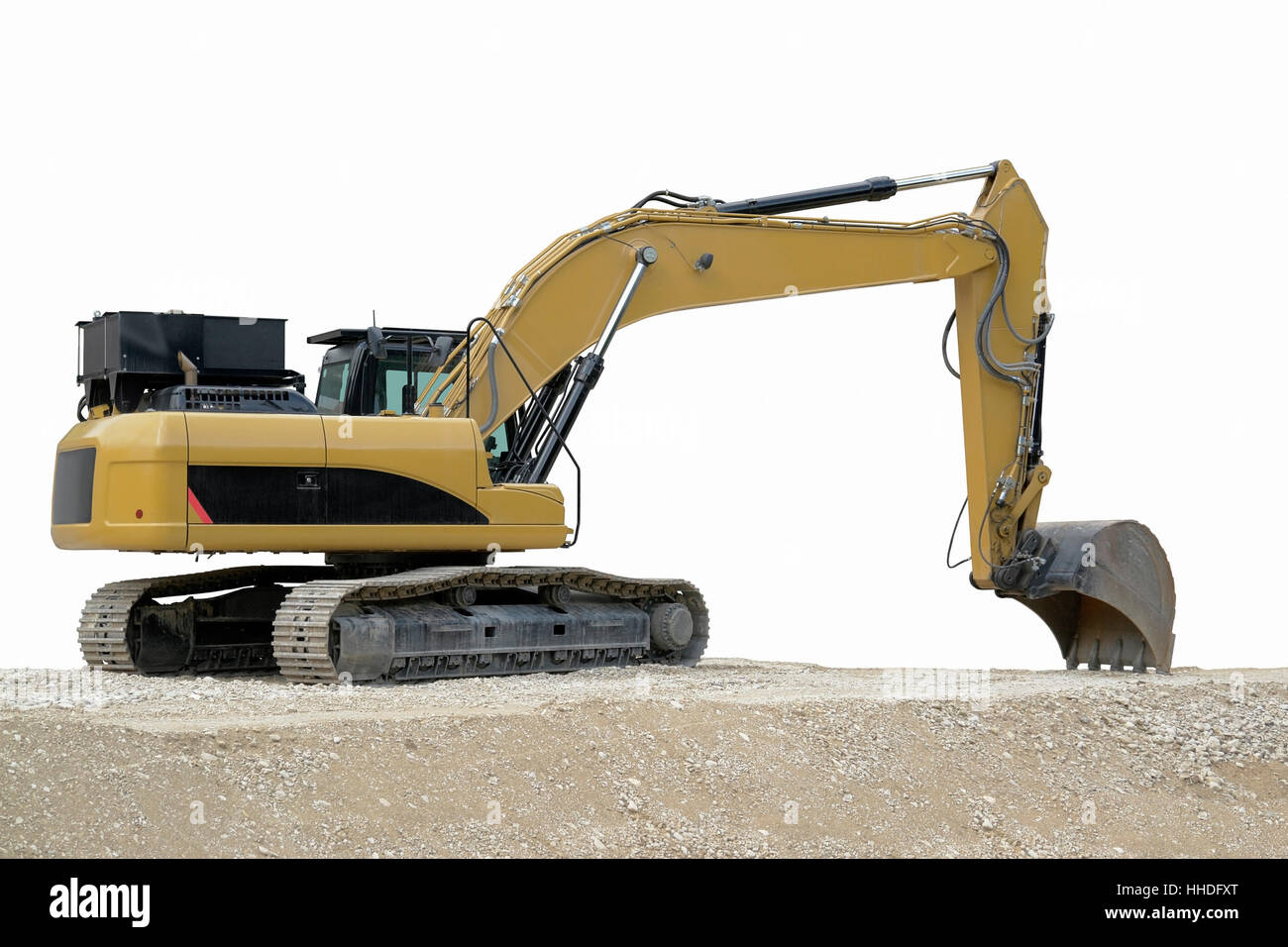outdoor shot of a yellow resting digger in fade out background Stock Photo
