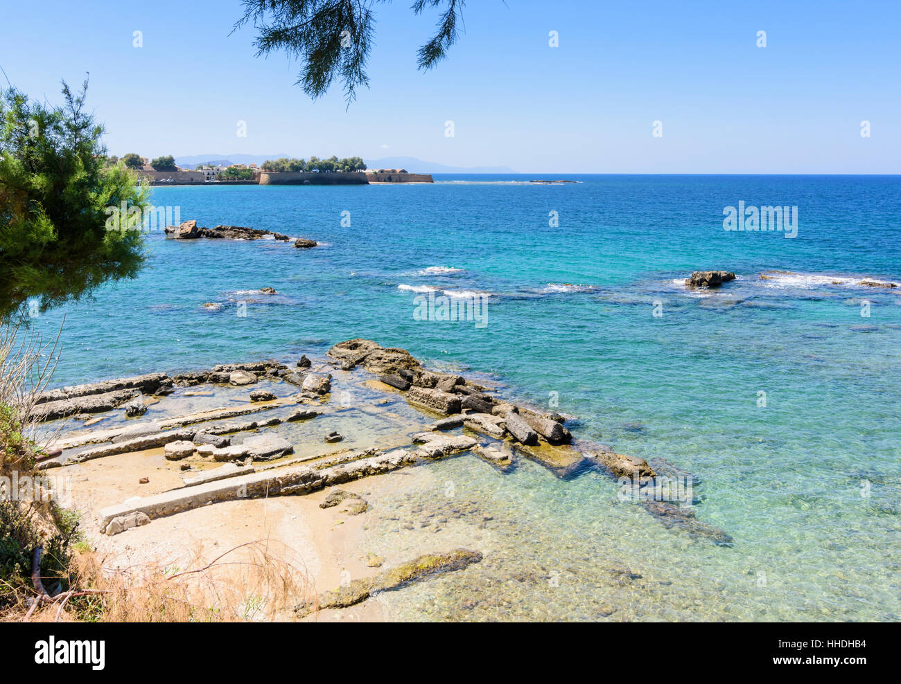 Stone ruins in the ocean west of Koum Kapi beach, Chania, Crete, Greece Stock Photo