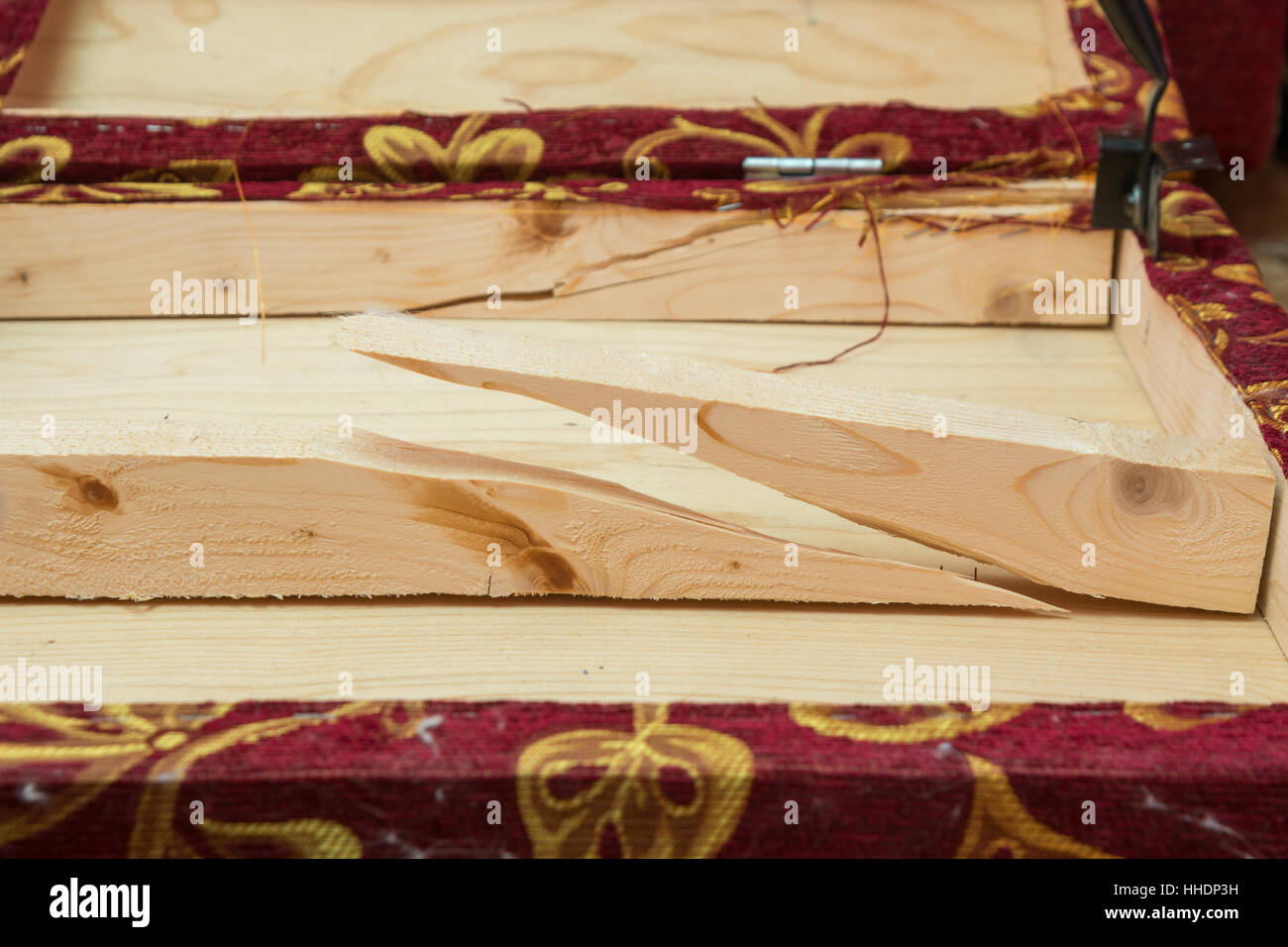 Broken wooden beams the edge of the sofa hardness Stock Photo Alamy