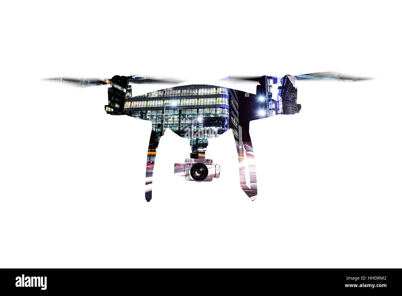 Double exposure. Hovering drone and city at night. Isolated. Stock Photo