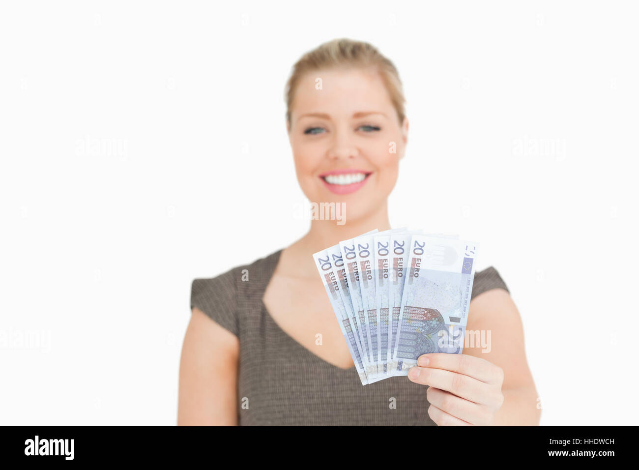 Pretty woman showing euros banknotes againsta white background Stock ...