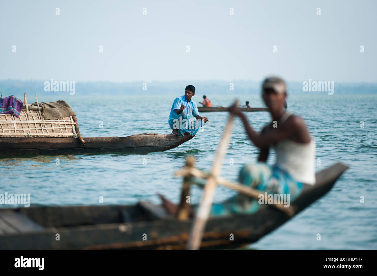 Fishing boats on Kaptai Lake in the Chittagong Hill Tracts, Bangladesh Stock Photo