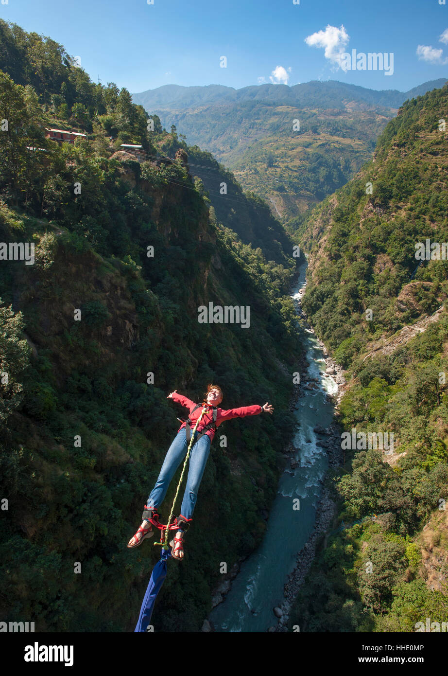 A Girl Jumps A Bungy Backwards Nepal Stock Photo Alamy