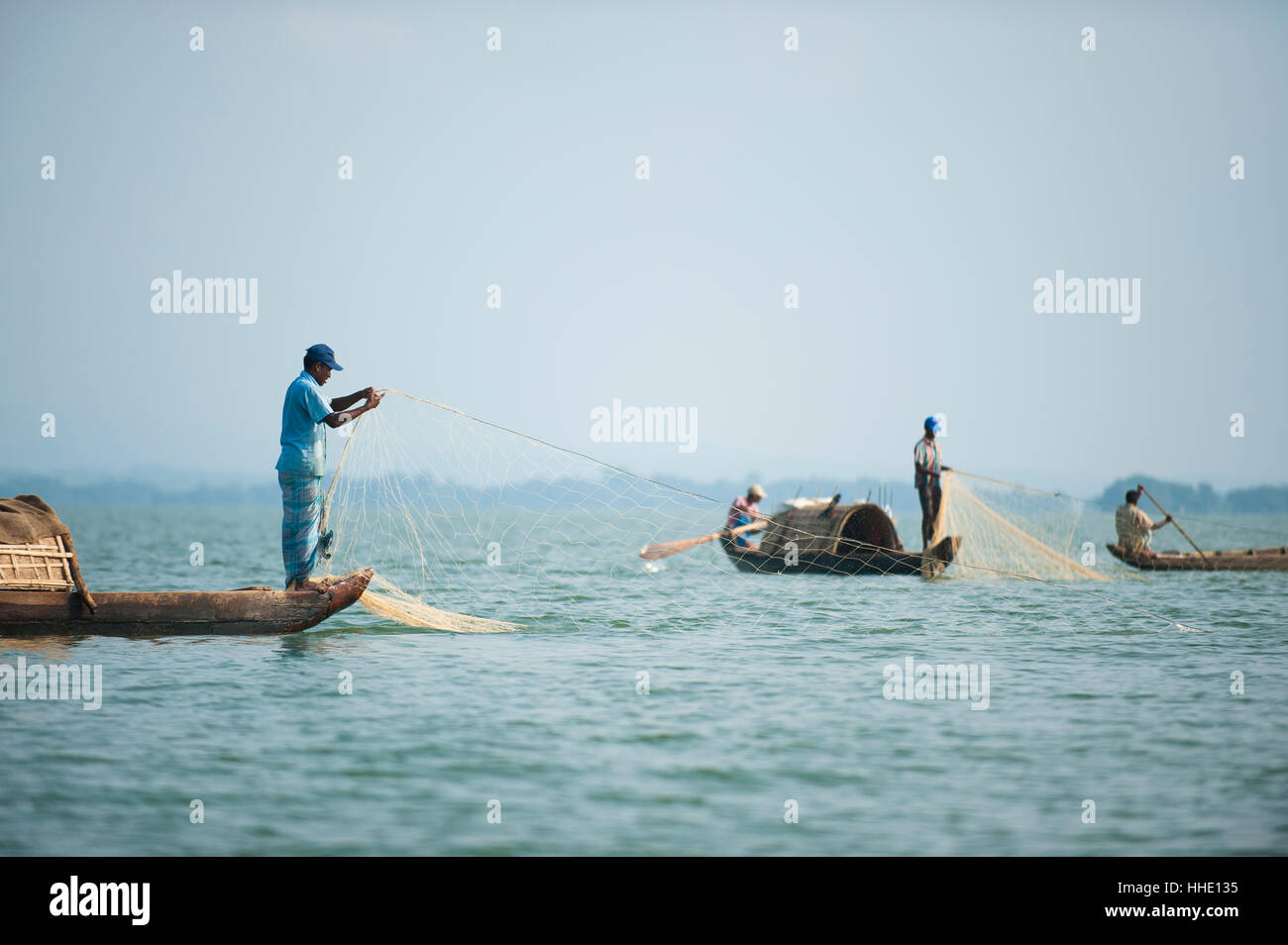 Fishing boats on Kaptai lake in the Chittagong Hill Tracts, Bangladesh Stock Photo