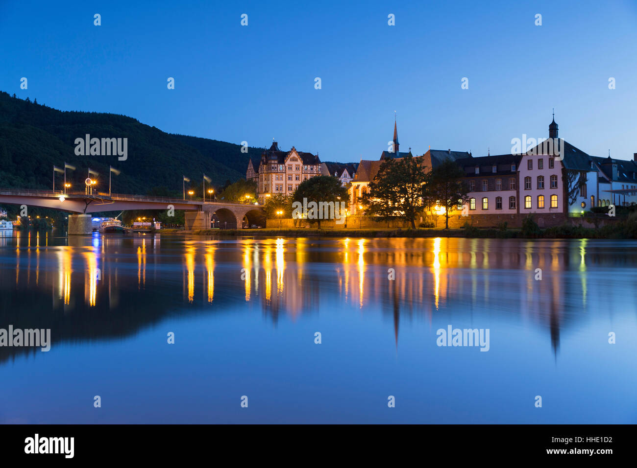 View of River Moselle and Bernkastel-Kues at dusk, Rhineland-Palatinate, Germany Stock Photo