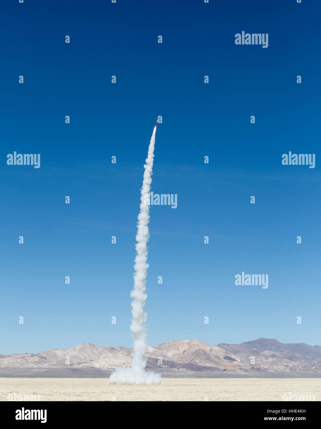 Rocket shooting into vast, desert sky, Black Rock Desert, Nevada Stock Photo