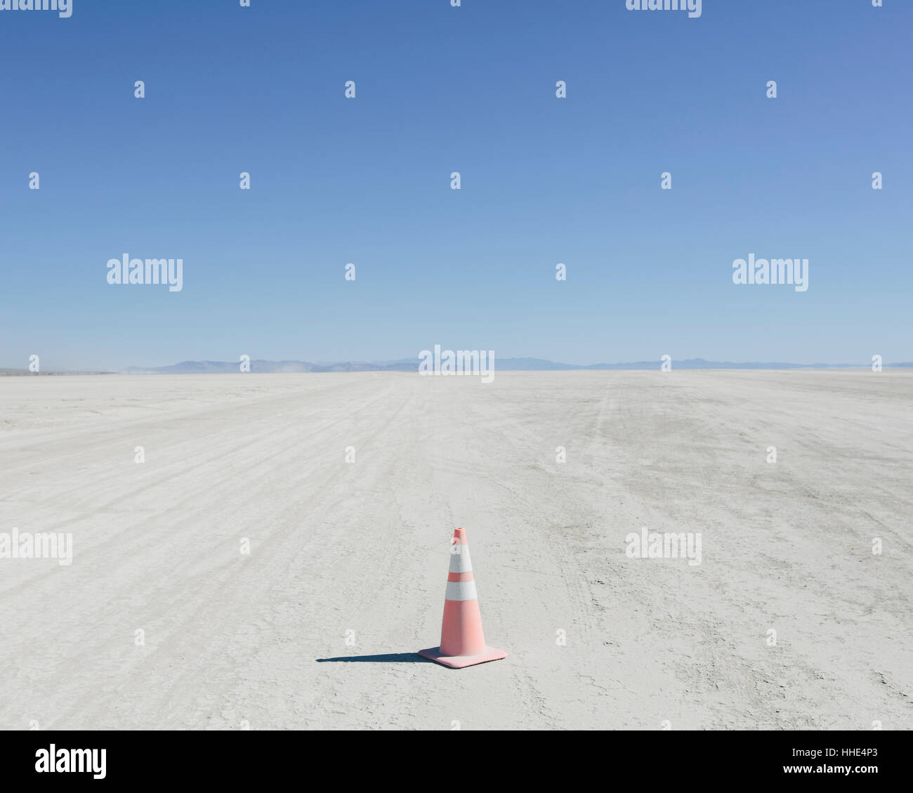 Traffic cone in vast desert, Black Rock Desert, Nevada Stock Photo