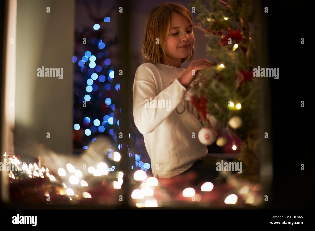 Shot decorating christmas tree hi-res stock photography and images - Alamy