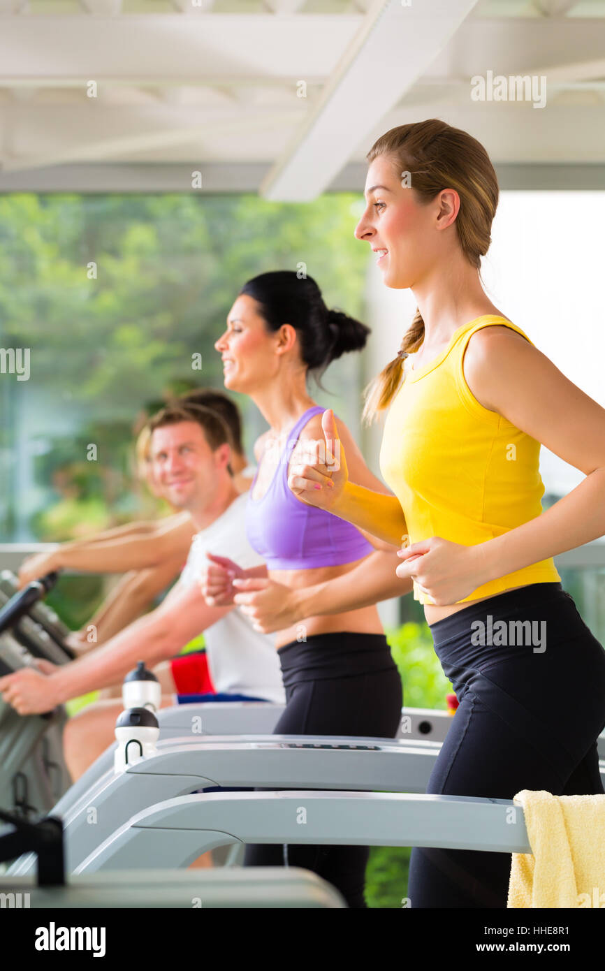 gym - people playing sports on treadmill Stock Photo - Alamy