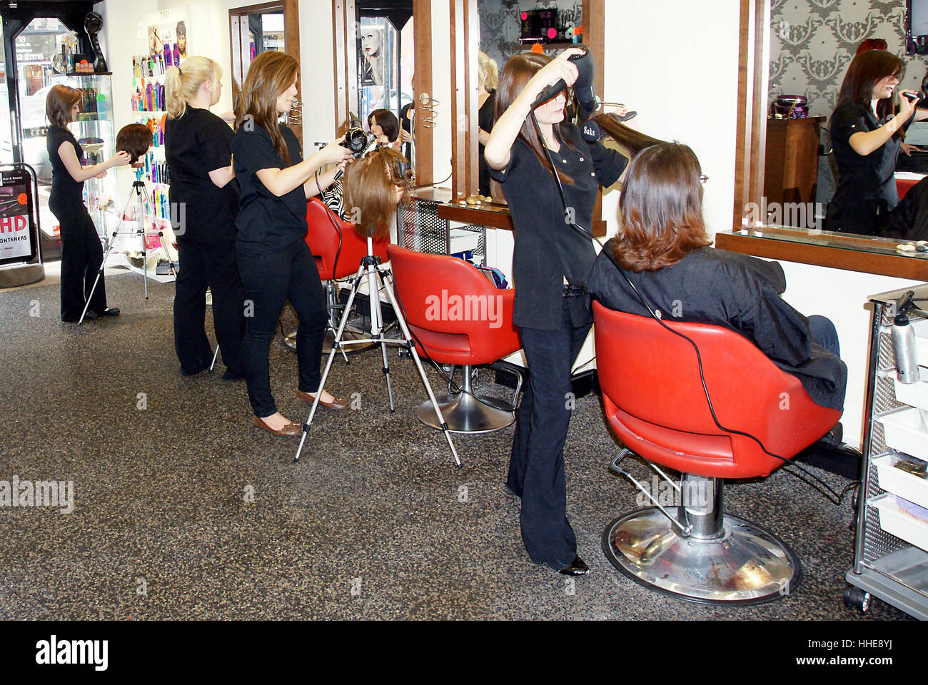 hairdressers Training in Hair salon Stock Photo