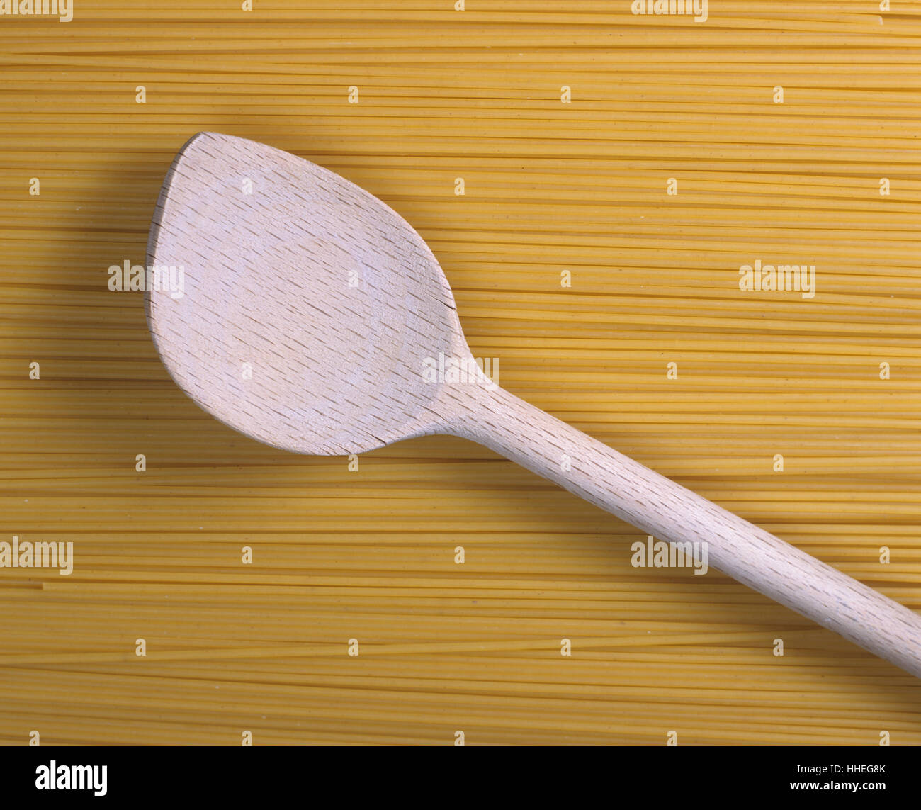 Wooden spoon and spaghetti Stock Photo Alamy