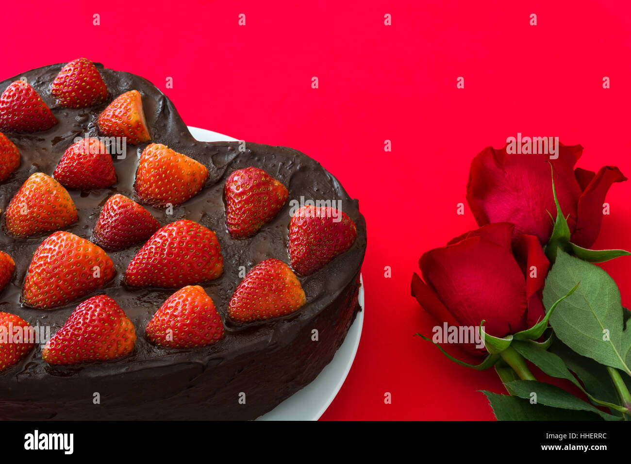 Heart shaped cake and red roses for Valentine's Day or mother's day on ...