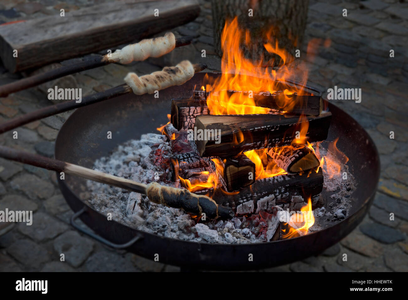 open fire cooking traditional bread at Christmas market,Basel,Switzerland Stock Photo