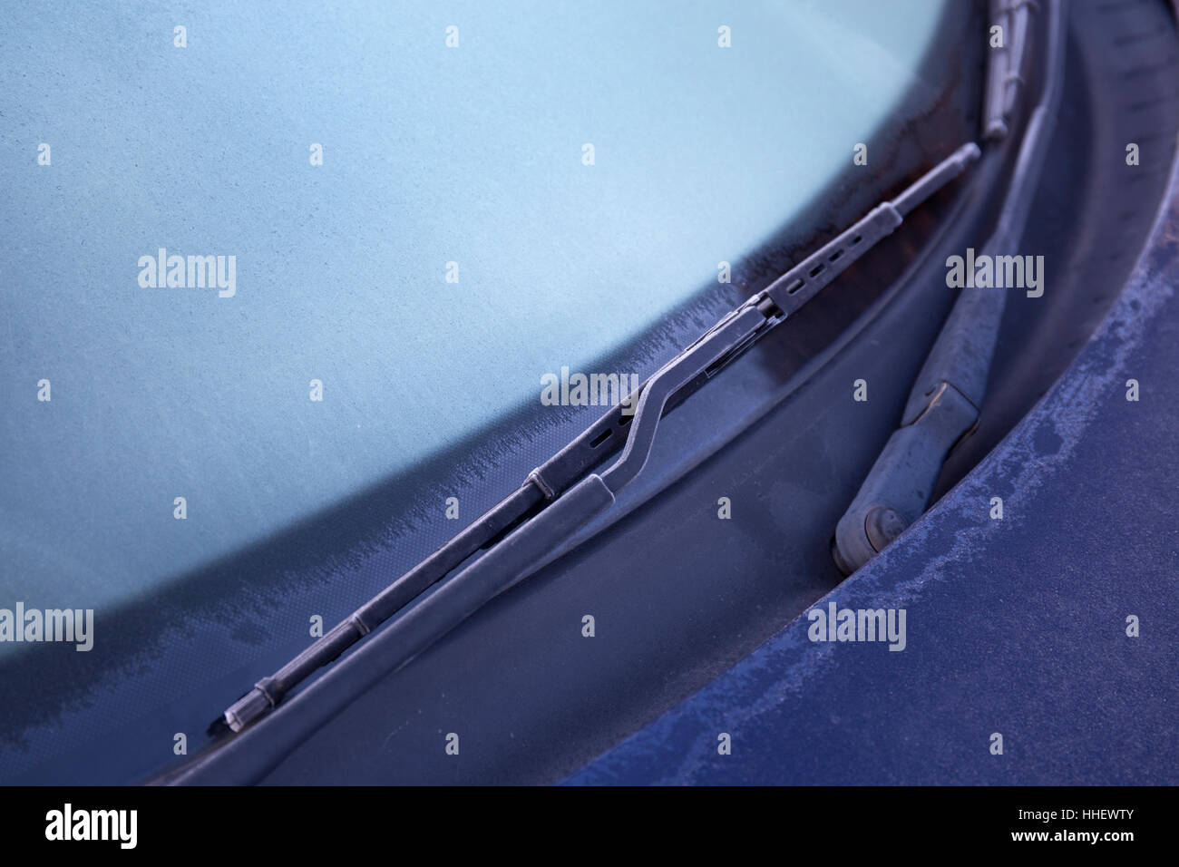 Car window in frost at wintertime Stock Photo