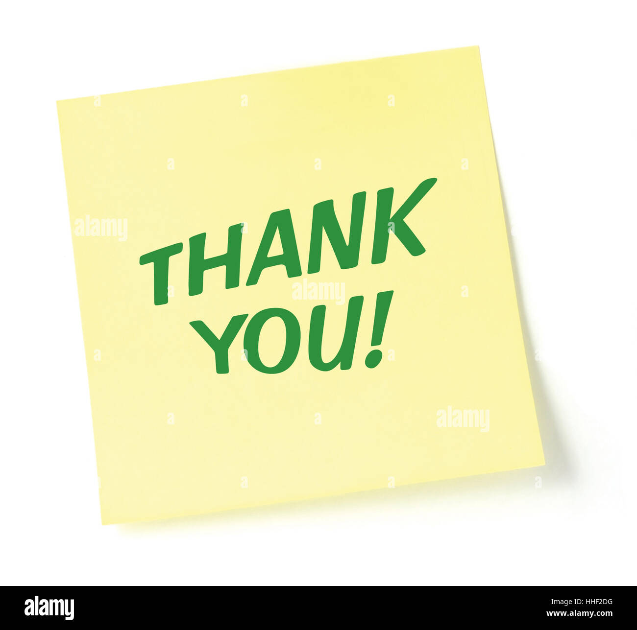 Yellow Sticky Thank You Text Note, Green Post-It Style Sticker, Large Detailed Isolated Macro Closeup Stock Photo