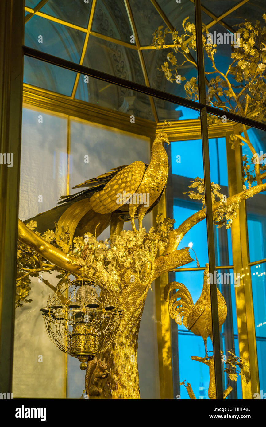SAINT PETERSBURG, RUSSIA - DECEMBER 25, 2016: The Peacock Clock, large automaton featuring three life-sized mechanical birds in Hermitage Stock Photo