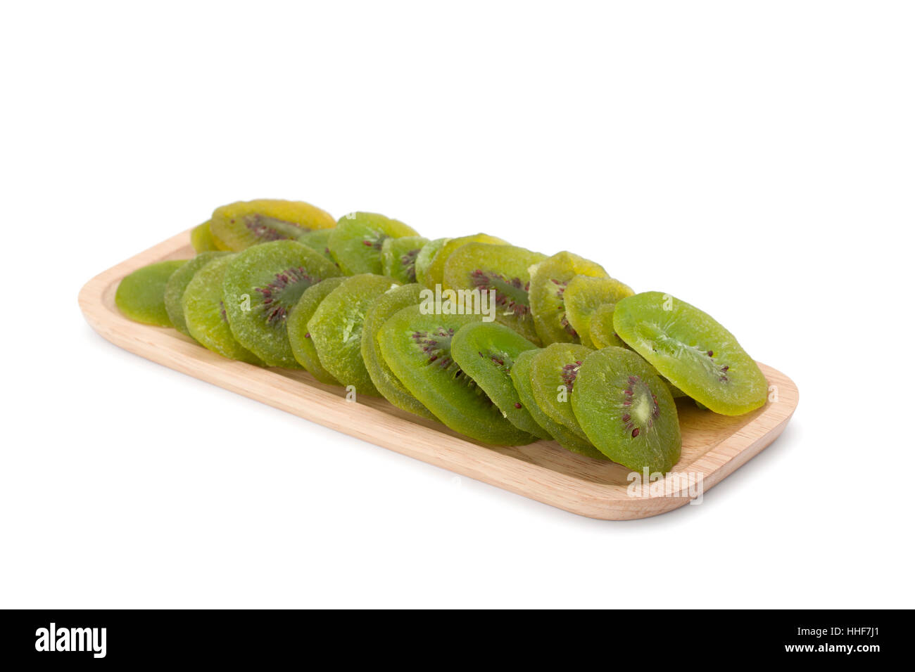 kiwi dried fruit in woodenware isolated on white background with clipping path Stock Photo