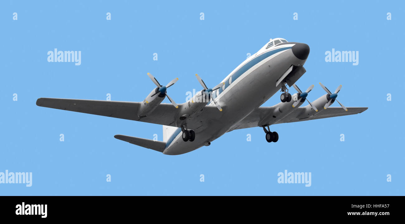 low-angle shot of a propeller aircraft in blue back Stock Photo