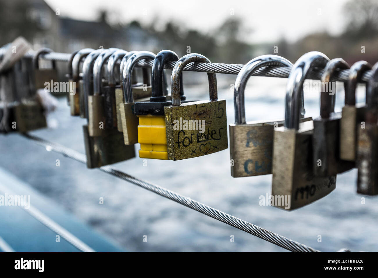 Padlocks attached to the cabling of the Weir Bridge over the River Wye